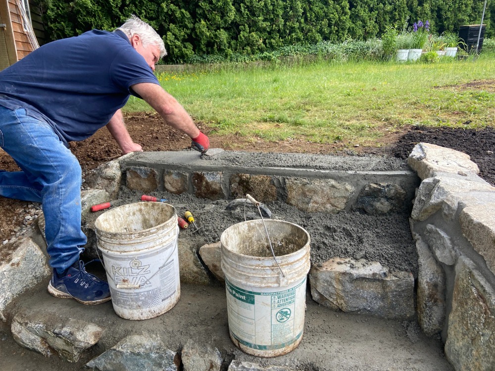 Natural stone steps connecting two levels of a sloped property